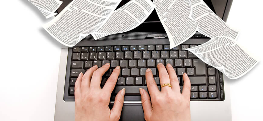 copywriter-typing-documents